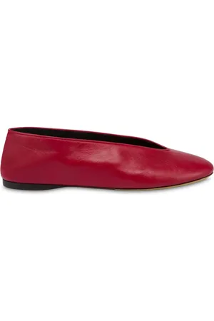 Moschino Flats con puntera redonda