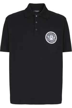 Balmain Playera tipo polo con monedas estampadas