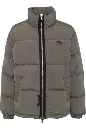 A Bathing Ape Chamarra capitonada con logo Moonface