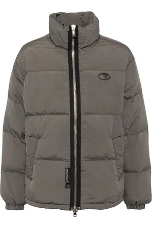 A Bathing Ape Chamarra capitonada con logo Moonface