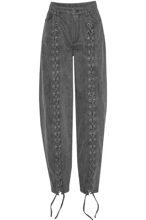 ROTATE Jeans con agujetas