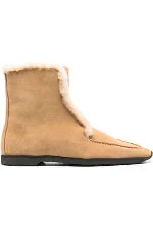 Totême Botas con bordes texturizados