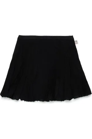 Nº21 Falda con pliegues