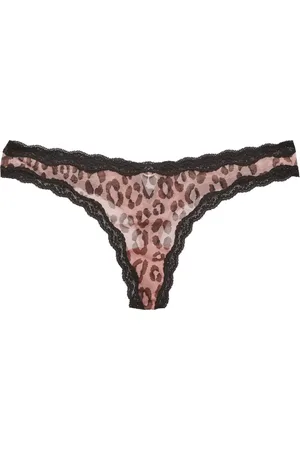 FLEUR DU MAL Tanga traslúcida con estampado de leopardo