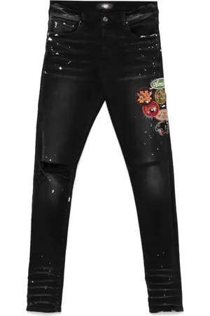 AMIRI Skinny jeans con detalle de parche
