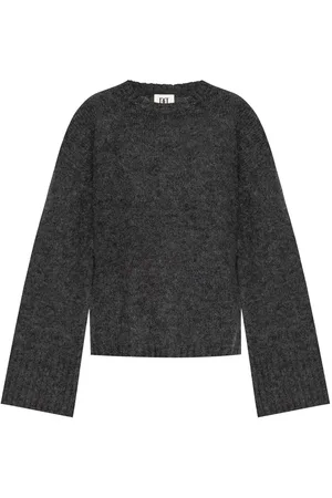 By Malene Birger Suéter con mangas anchas