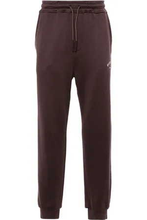 ELEVENTY Pants con logo estampado