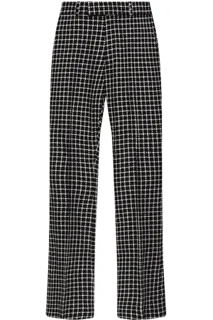 AMIRI Pantalones de bouclé acampanados