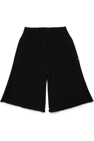 Maison Margiela Shorts deportivos con costuras