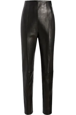 Khaite Pantalones tapered con bolsillos