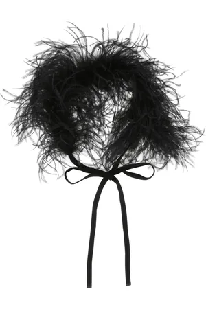 ART ESSAY Mascada de plumas