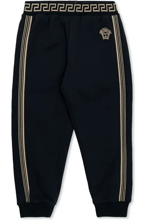 VERSACE Pants con detalle Greca
