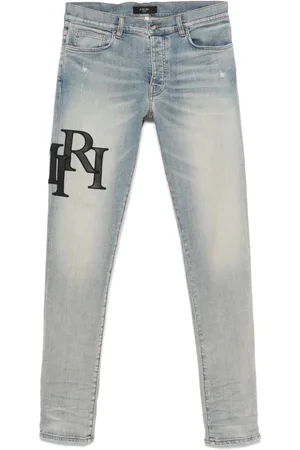 AMIRI Jeans con logo escalonado