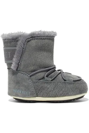 Moon Boot Botines con ribete de pelo artificial