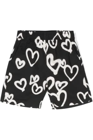 Molo Shorts con corazones estampados