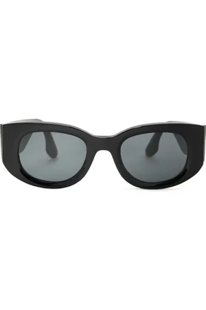 Victoria Beckham Lentes de sol con armazón ovalada y micas oscuras