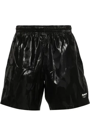 Alexander McQueen Shorts de playa con logo estampado