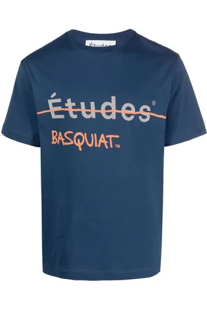 Etudes Playera con estampado de Etudes x Jean-Michel Basquiat