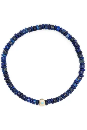 LUIS MORAIS Pulsera en oro amarillo de 14kt con cuentas de lapislázuli