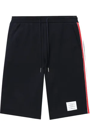 Thom Browne Shorts deportivos con rayas laterales