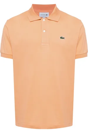 Lacoste Playera tipo polo con aplique del logo