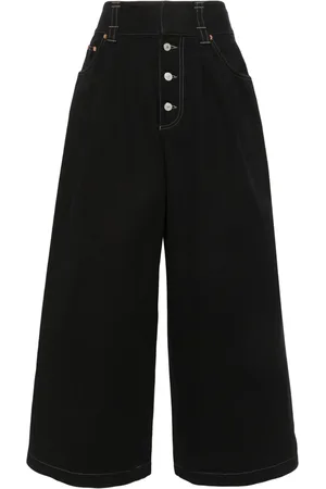 Gucci Jeans anchos con etiqueta del logo