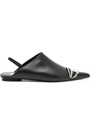 Diesel Mules con placa del logo