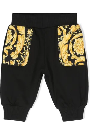 VERSACE Pants con estampado Barocco