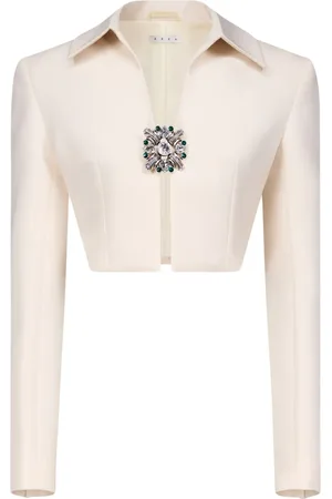 AREA Chamarra corta con broche de cristal