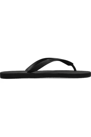 Vetements Flip flops con logo en relieve
