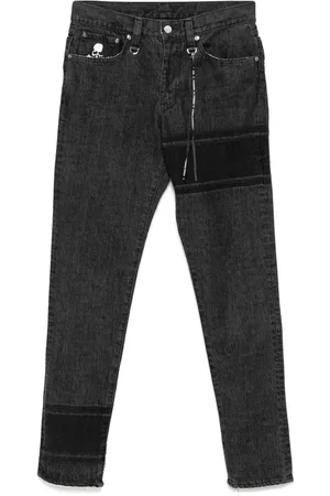 MASTERMIND Skinny jeans con logo bordado