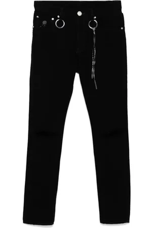 MASTERMIND Jeans con efecto envejecido y logo estampado
