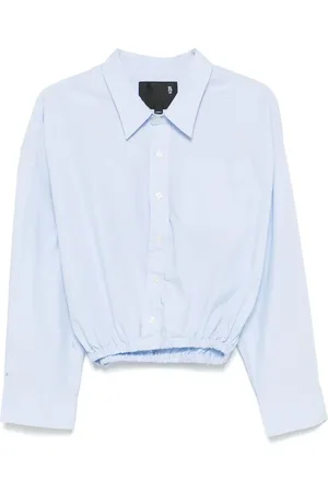 R13 Blusa con dobladillo elástico
