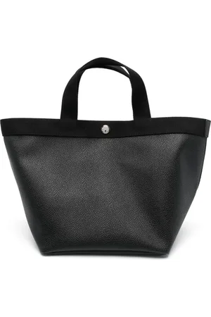Hervè Chapelier Tote con botones de presión oculto