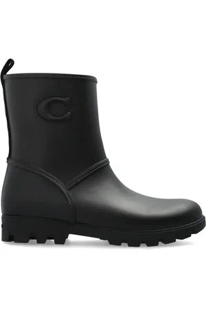 Coach Botas con logo en relieve