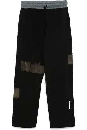 Stain Shade Pants con paneles