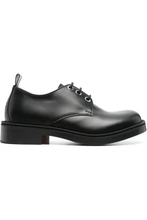 Alexander McQueen Zapatos derby con motivo Skull