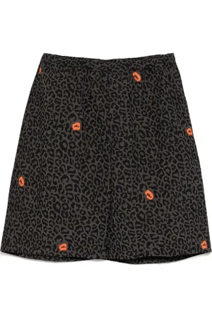 UNDERCOVER Shorts estampados