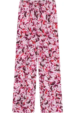 DRIES VAN NOTEN Pantalones con estampado gráfico
