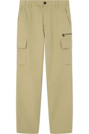 VERSACE Pantalones con bolsillos y solapa