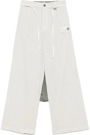 Maison Mihara Yasuhiro Pantalones con rayas estampadas
