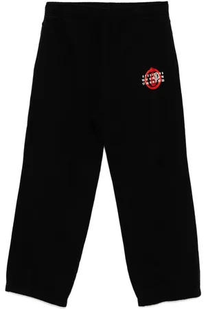 Maison Margiela Pants con logo estampado