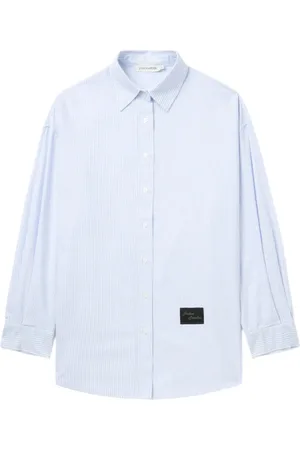 JOSHUA SANDERS Camisa con botones