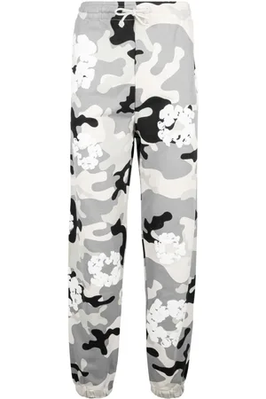 DENIM TEARS Pants con estampado militar
