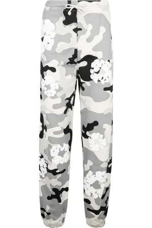 DENIM TEARS Pants con estampado militar
