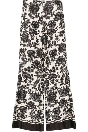 Sandro Pantalones con efecto arrugado