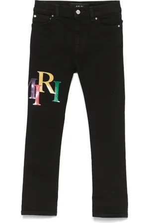 AMIRI Jeans con logo estampado