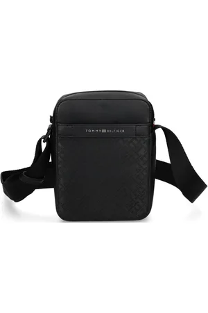 Tommy Hilfiger Mochila tipo mensajero con monograma TH