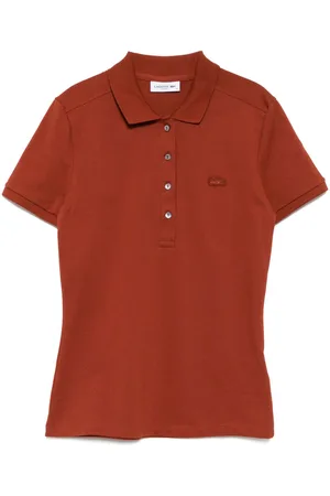 Lacoste Playera tipo polo con parche del logo