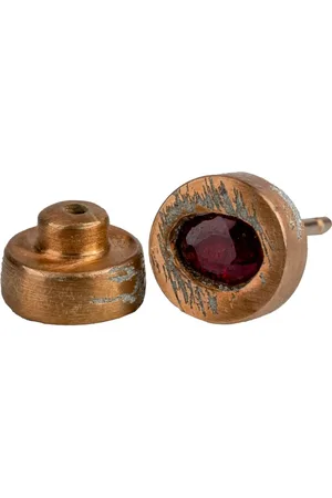 PARTS OF FOUR Arete pequeño en plata de ley bañada en oro rosa de 18kt con rubí